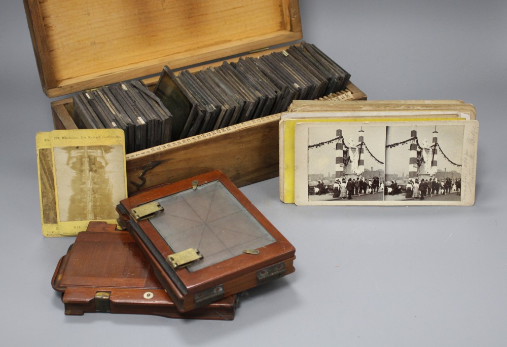 A collection of Magic Lantern slides, mostly text, a group of stereographic cards and three camera backplates